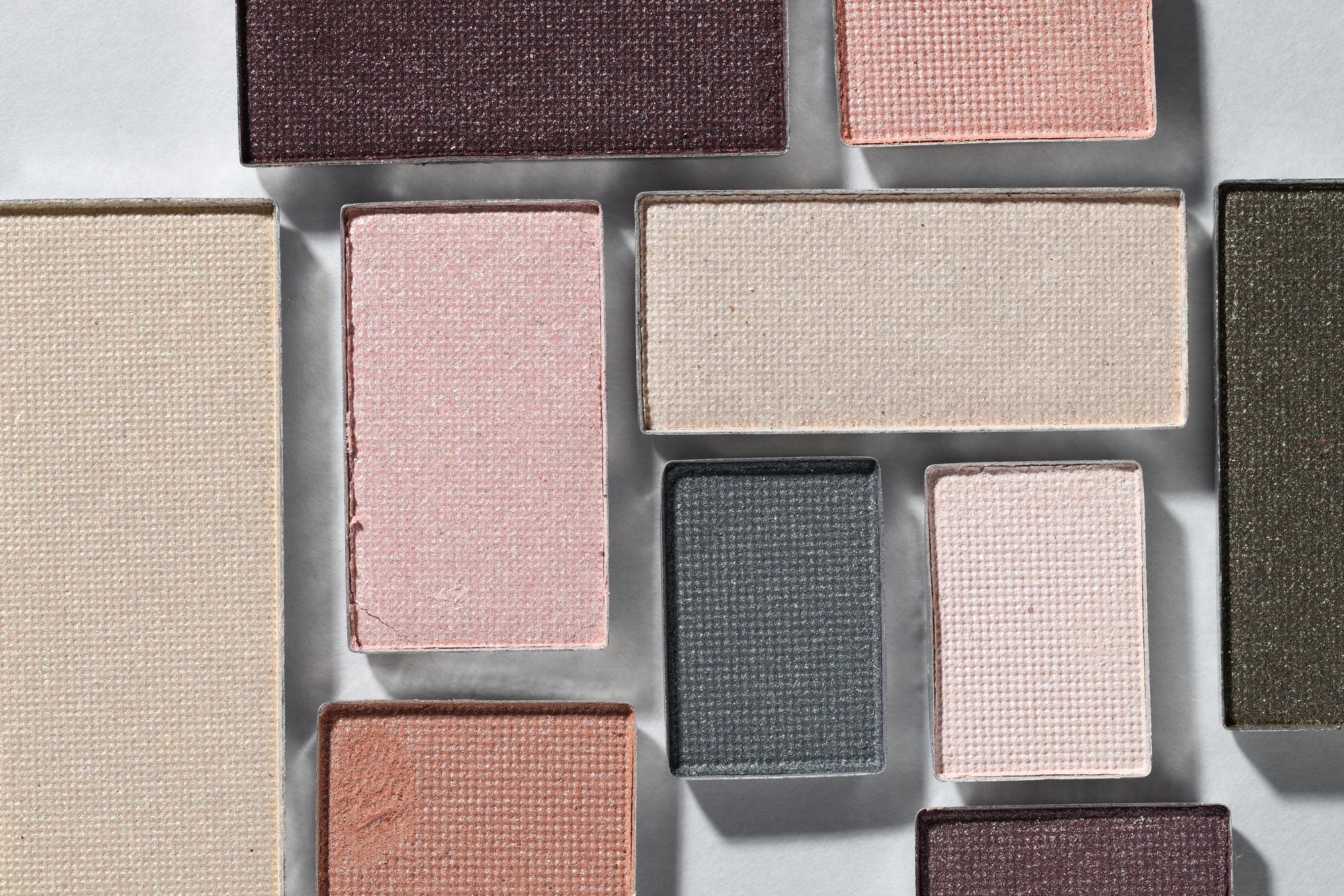 Stacked sample swatches and threads